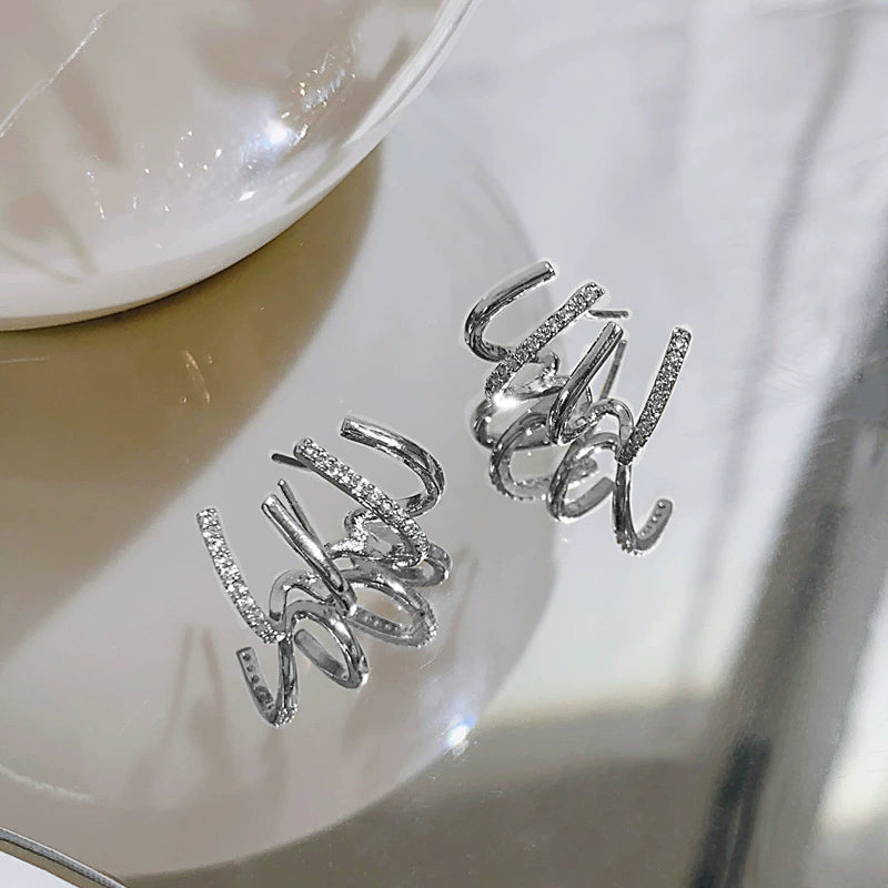 Women's Niche Design Internet Celebrity Fashion Four-claw Earrings Birthday Gift