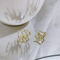Women's Niche Design Internet Celebrity Fashion Four-claw Earrings Birthday Gift